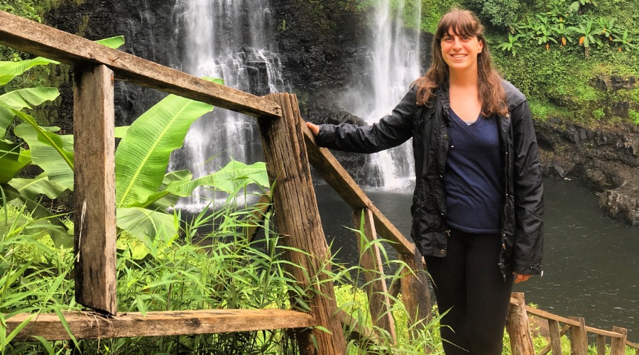 Andrea Kidder in front of waterfall in Thailand