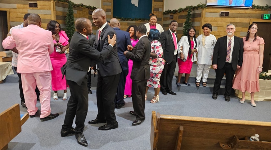 Life Chapel International greeting each other
