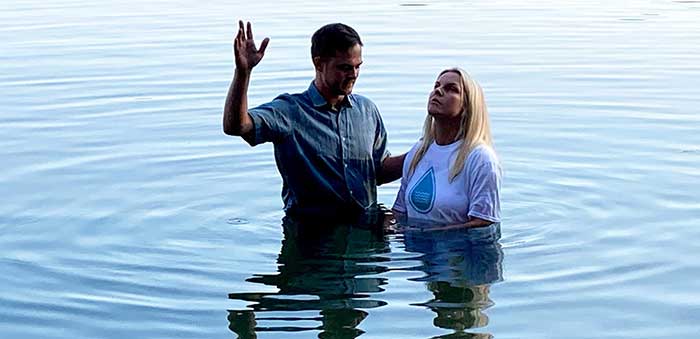Second woman being baptized