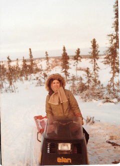 Lee Castor on a Ski-Doo in Tadoule Lake coming back from getting water from a hole in the ice circa 1979. 