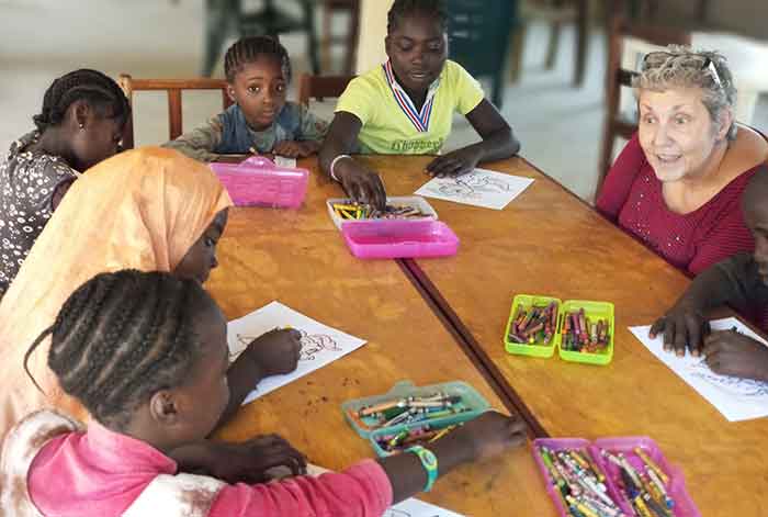 Teacher coloring with students