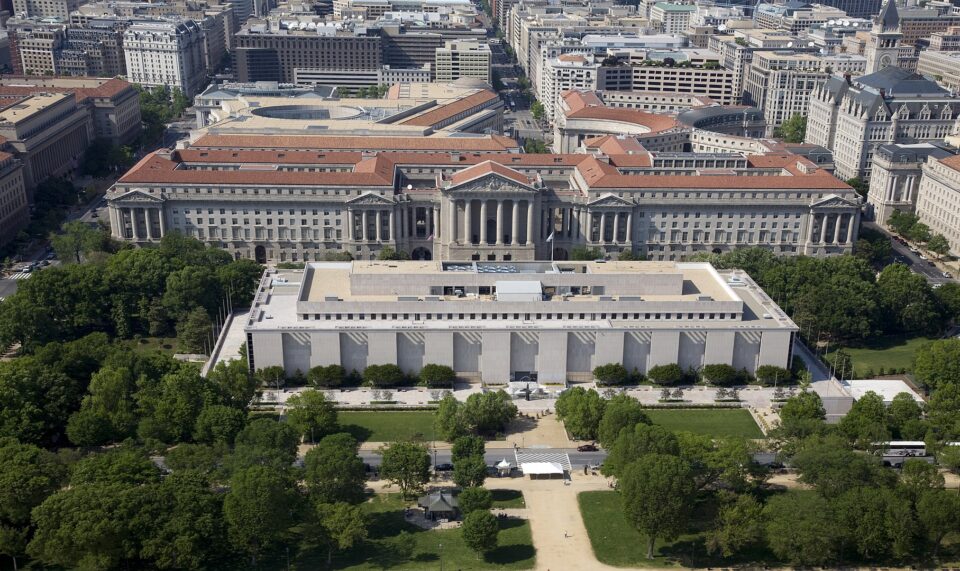 Aerial view of the Museum of Natural History and the Federal Triangle. The museum's collections total over 126 million specimens of plants, animals, fossils, minerals, rocks, meteorites, and human cultural artifacts. It is the second most popular of all of the Smithsonian museums and is also home to about 185 professional natural history scientists Ñ the largest group of scientists dedicated to the study of natural and cultural history in the world.