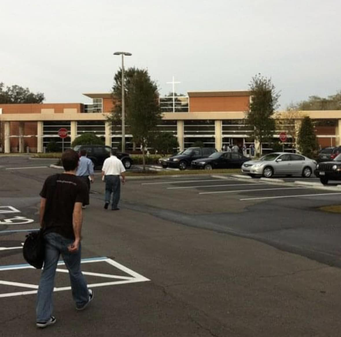 Dan Nichols walking into Converge building.