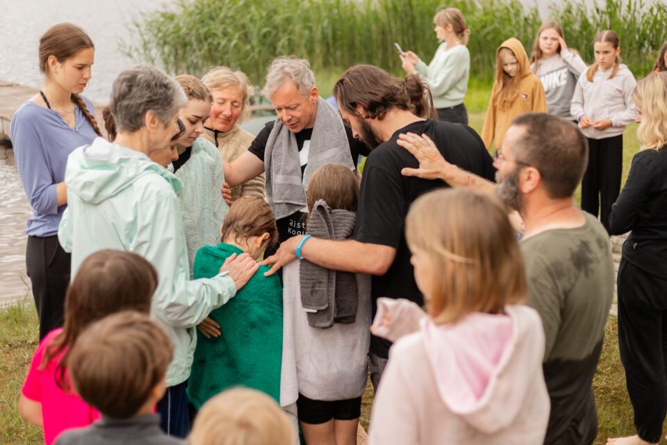 Praying at Hoolime Koos in Estonia.