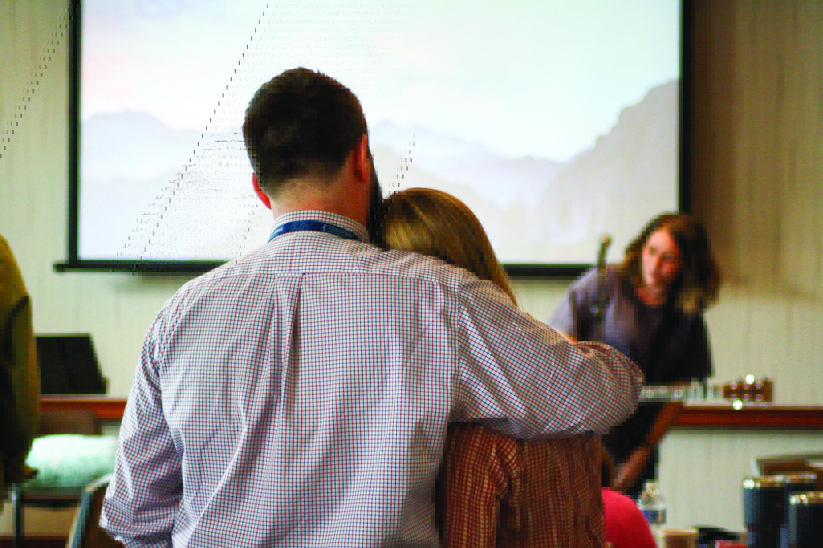 A couple embraces at the 2023 Anchored marriage retreat in New Hampshire, an event Converge Northeast held for pastors and their spouses. Image courtesy of Converge Northeast.